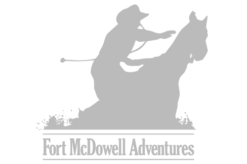 Fort McDowell Adventures logo featuring a silhouette of a cowboy riding a horse above the text 'Fort McDowell Adventures.'